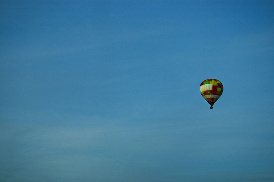 On our way from Vimy Ridge to Reims, the capital of the Champagne region, Jamie noticed a hot air baloon and snapped this shot. The contrast between the vivid colours of the hot air balloon and the sea of blue combine to make a remarkable shot.